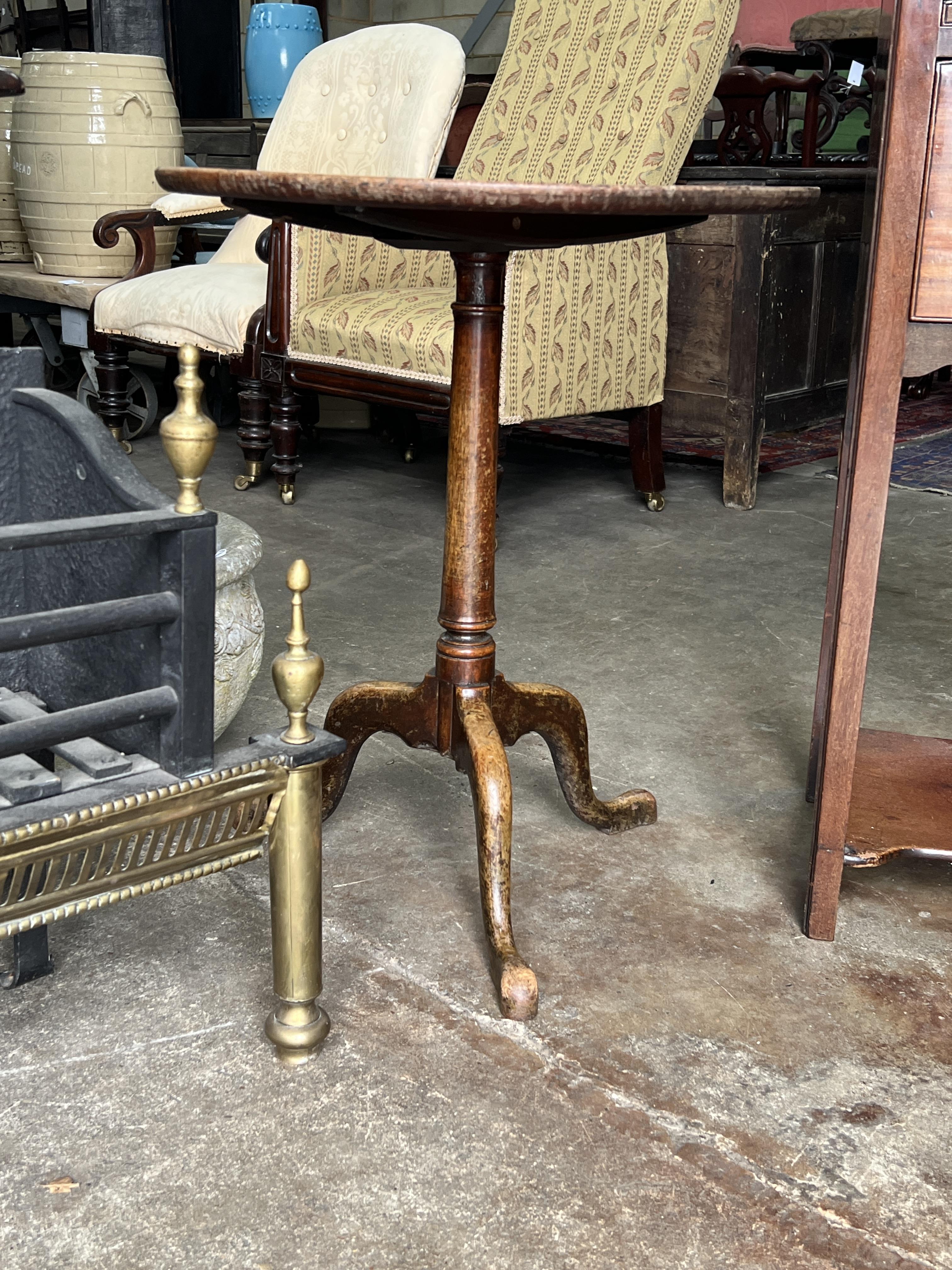 A George III mahogany tray top bedside cupboard, width 33cm, depth 33cm, height 81cm together with a 19th century circular tilt top wine table